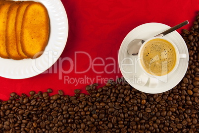 coffee cup from above with coffee beans