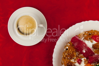white cup of coffee  on red background