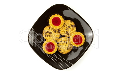 Plate of cookies isolated on white background