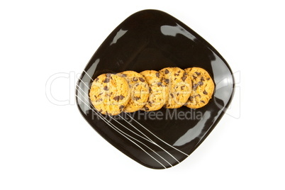 Plate of cookies isolated on white background