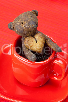 teddy bear  handmade and cookie  in the form of heart  in a cup