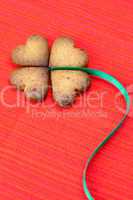 cookie  in the form of an Irish clover and green and green  on a