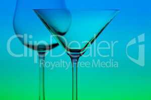 a conceptually illuminated glasses on gradient background