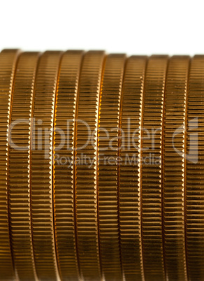 Edge view of stack of golden coins