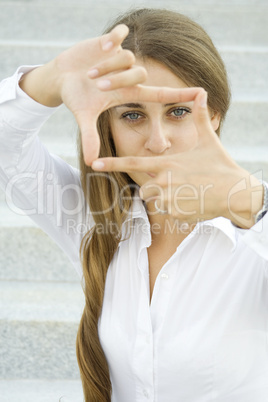 Looking through frame - sight businesswoman