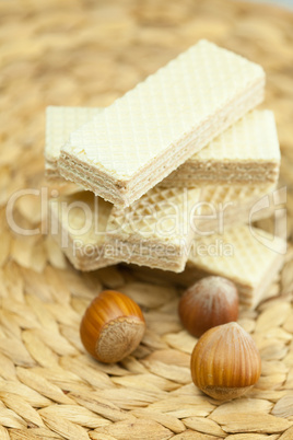 sweet wafers and nuts lying on a wicker mat