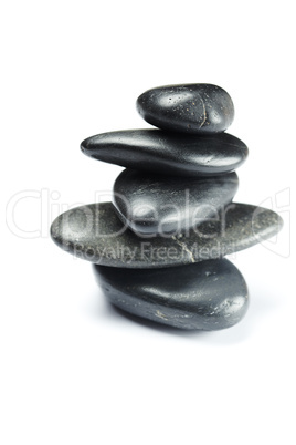 big black spa stones isolated on white