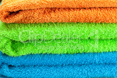 background of the three multi colored terry towels