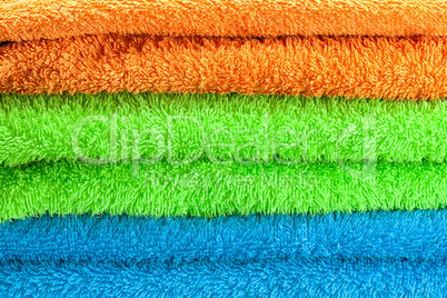 background of the three multi colored terry towels