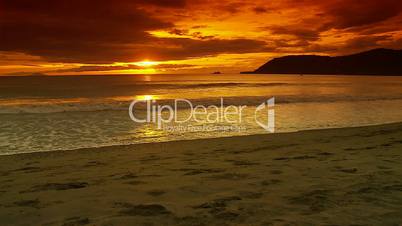 Golden sunrise on tropical beach