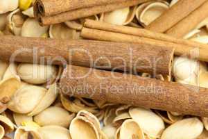 background from the shell of pistachio nuts and cinnamon sticks