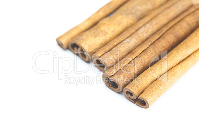 cinnamon sticks isolated on white