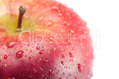 red apple with water drops isolated on white