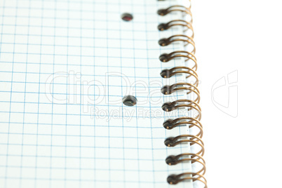 plaid notebook with a spiral  isolated on white