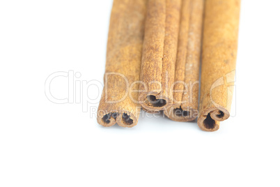 cinnamon sticks isolated on white