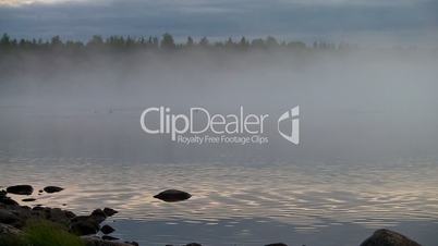 fog and ripples on a lake, loop