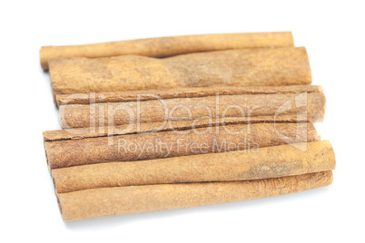 cinnamon sticks isolated on white