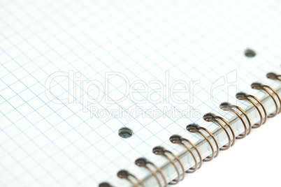 plaid notebook with a spiral  isolated on white