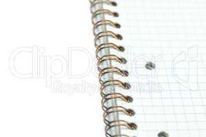 plaid notebook with a spiral  isolated on white