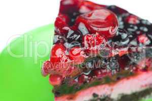 beautiful cake with berries on a plate isolated on white