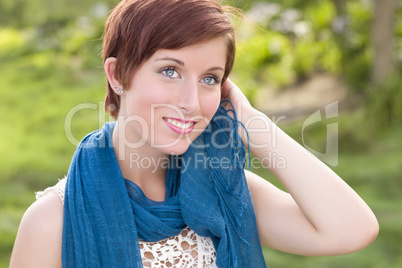 Pretty Blue Eyed Young Red Haired Adult Female Outdoor Portrait
