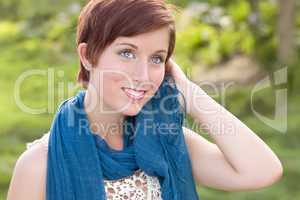 Pretty Blue Eyed Young Red Haired Adult Female Outdoor Portrait