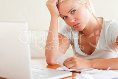 Stressed woman doing paperwork