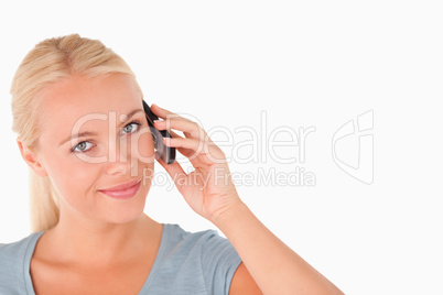 Cute smiling woman on the phone