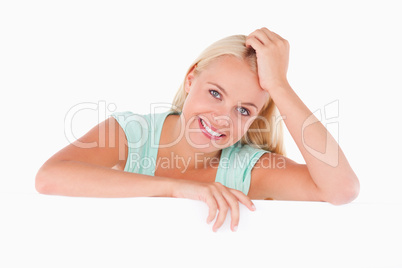 Close up of a woman standing behind a whiteboard Close up of a woman standing behind a whiteboard