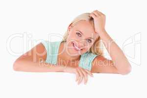 Close up of a woman standing behind a whiteboard