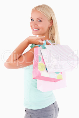 Close up of a Joyful woman with some shopping bags