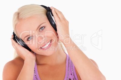 Cute woman listening to music