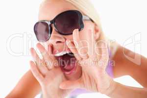 Charming woman with sunglasses in high spirits