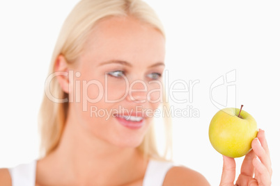 Gorgeous woman holding an apple