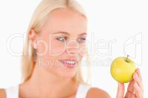 Gorgeous woman holding an apple