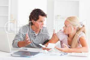 Couple arguing on expenses