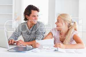 Surprised couple doing their accounts