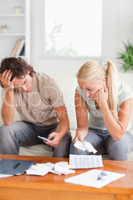 Calculating couple on a sofa