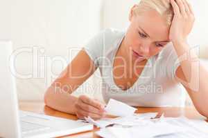 Despaired woman accounting