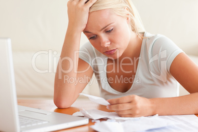 Worn out woman accounting