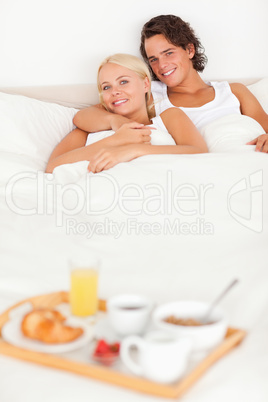 Couple lying on a bed