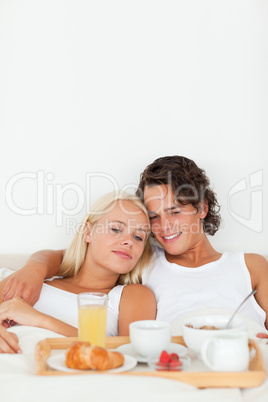Portrait of a cute couple having breakfast
