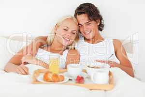 Cute couple having breakfast