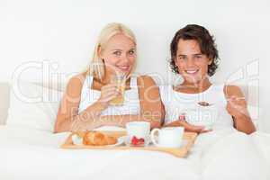 Lovely couple having breakfast
