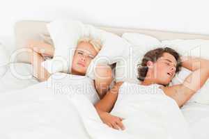 Young couple waking up