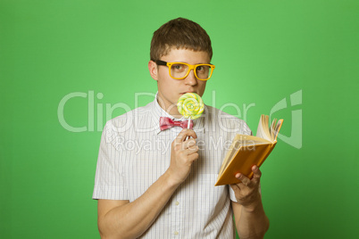 Young man bookworm reading