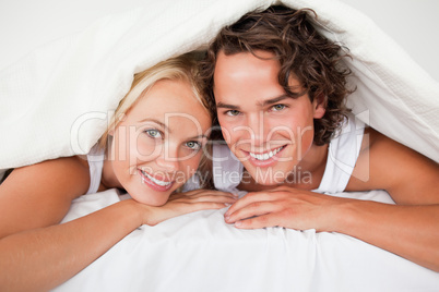 Couple under a duvet
