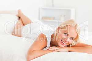 Smiling woman lying