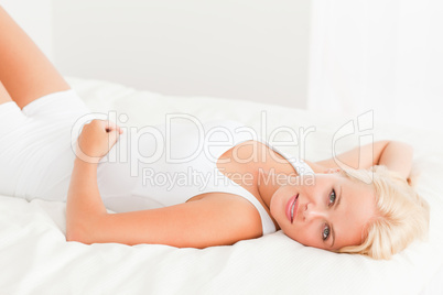 Gorgeous woman lying on her back