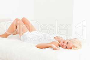 Dreaming woman lying on her back